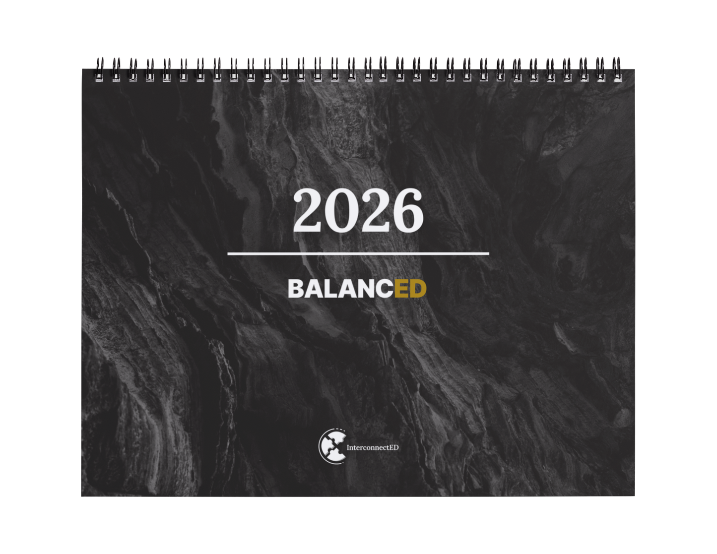 Calendar with '2026 Balanced' text on a textured black background