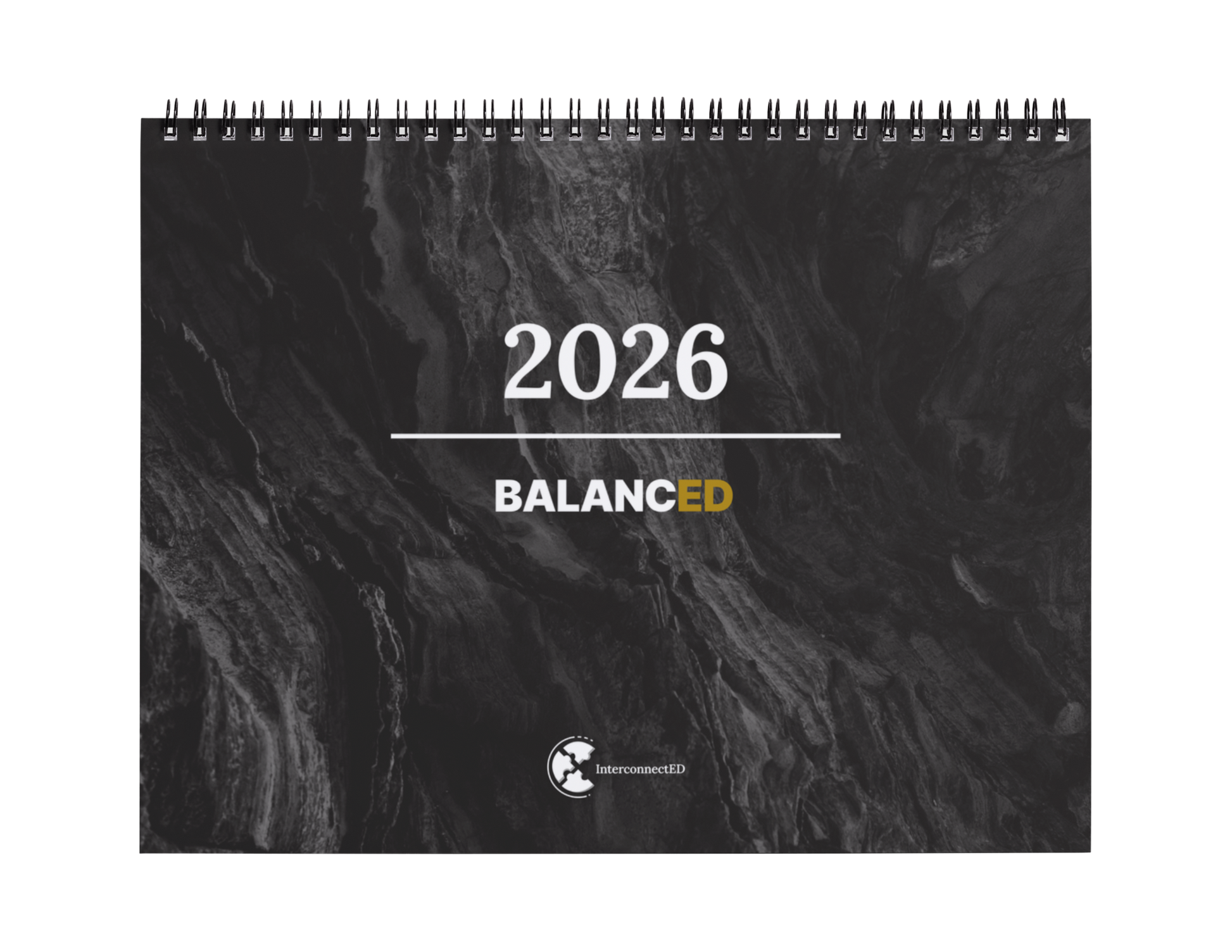 Calendar with '2026 Balanced' text on a textured black background